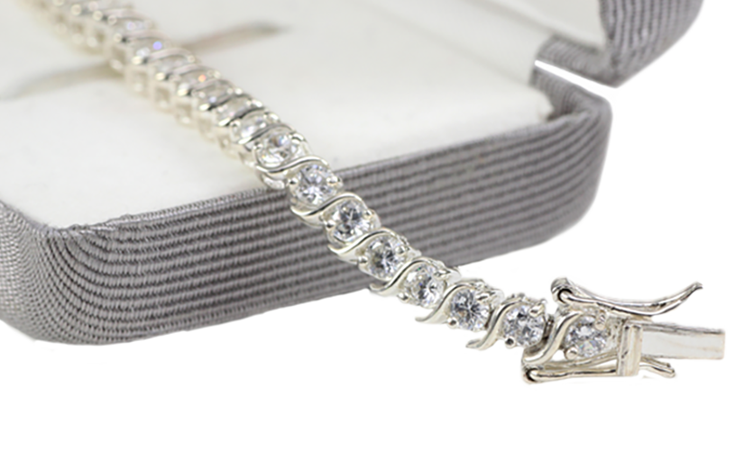 how much does a real diamond tennis bracelet cost        
        <figure class=